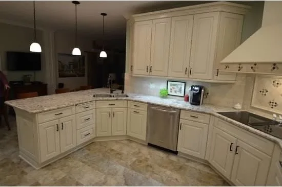 U-Shaped White Kitchen by Conrad Kitchen, Bath And Remodeling LLC - Photo 5