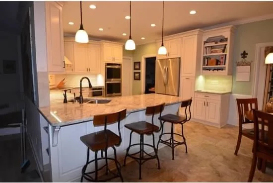 U-Shaped White Kitchen by Conrad Kitchen, Bath And Remodeling LLC - Photo 2