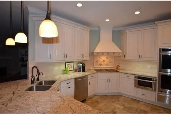 U-Shaped White Kitchen by Conrad Kitchen, Bath And Remodeling LLC - Photo 3