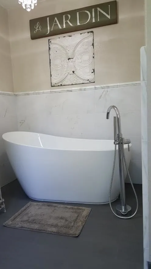 Marble White Bathroom by Henle Construction, Inc. - Photo 5