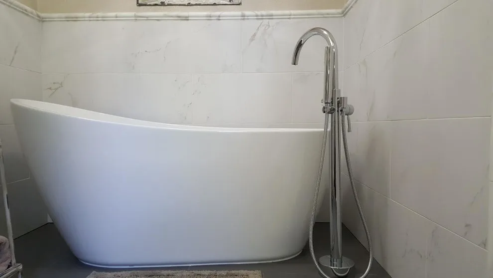 Marble White Bathroom by Henle Construction, Inc. - Photo 11