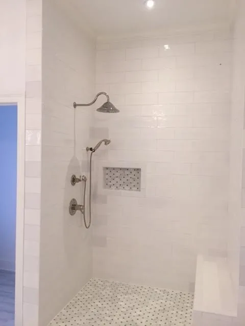 White Bathroom Renovation by Northshore Renovations - Photo 3