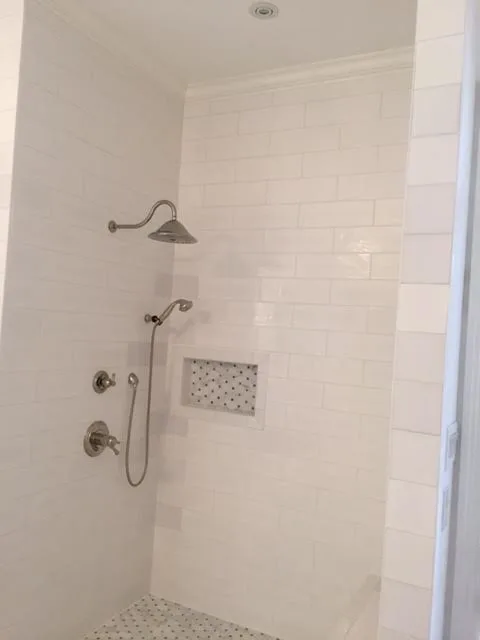 White Bathroom Renovation by Northshore Renovations - Photo 5