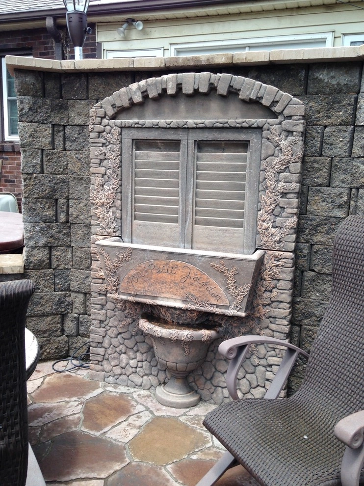 Natural Stone and Statue Garden by Breaking Ground - Photo 43