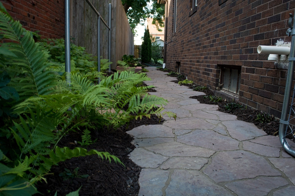 Natural Stone and Statue Garden by Breaking Ground - Photo 9