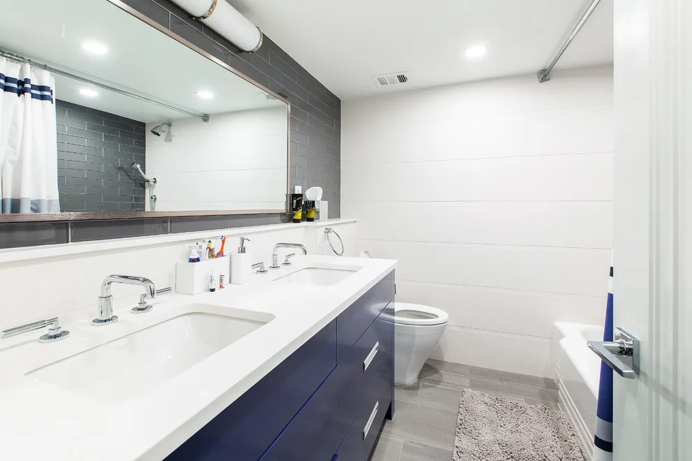 Wood Accented Full Apartment Renovation by Eastside Design & Build Inc. - Photo 11