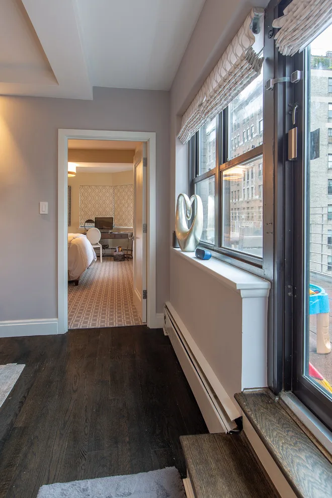 Wood Accented Full Apartment Renovation by Eastside Design & Build Inc. - Photo 14