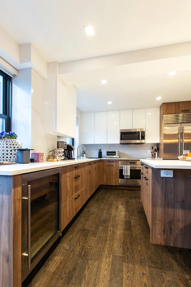 Wood Accented Full Apartment Renovation by Eastside Design & Build Inc. - Photo 17