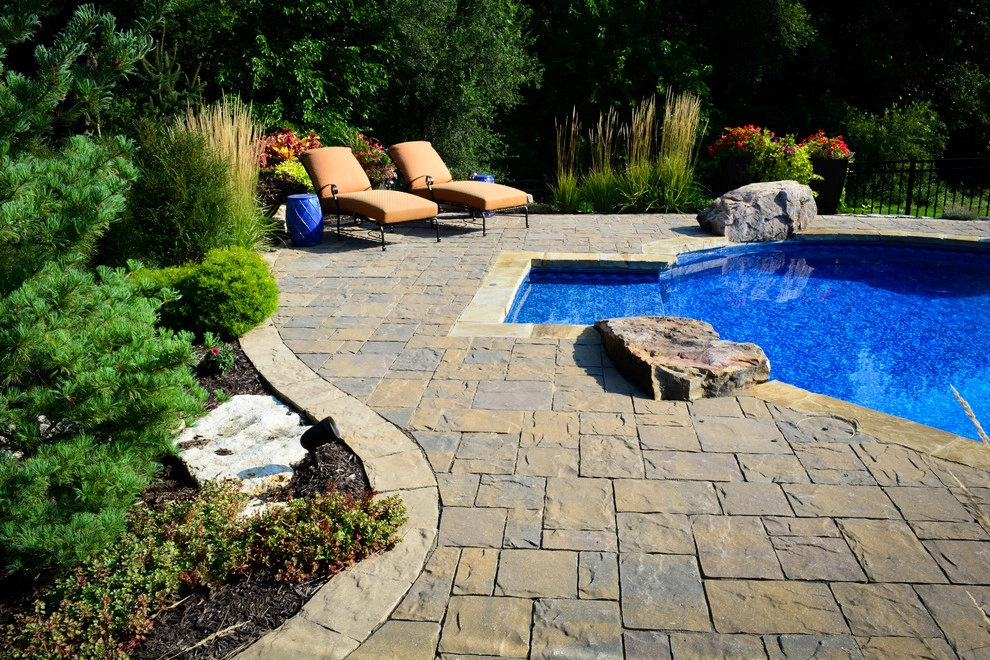Innovative Pool Patio by Breaking Ground - Photo 11