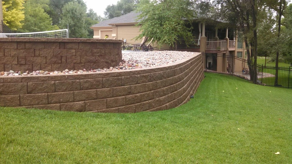 Backyard Space with Pool and Fire Pit by Executive Lawn & Landscaping, LLC. - Photo 2
