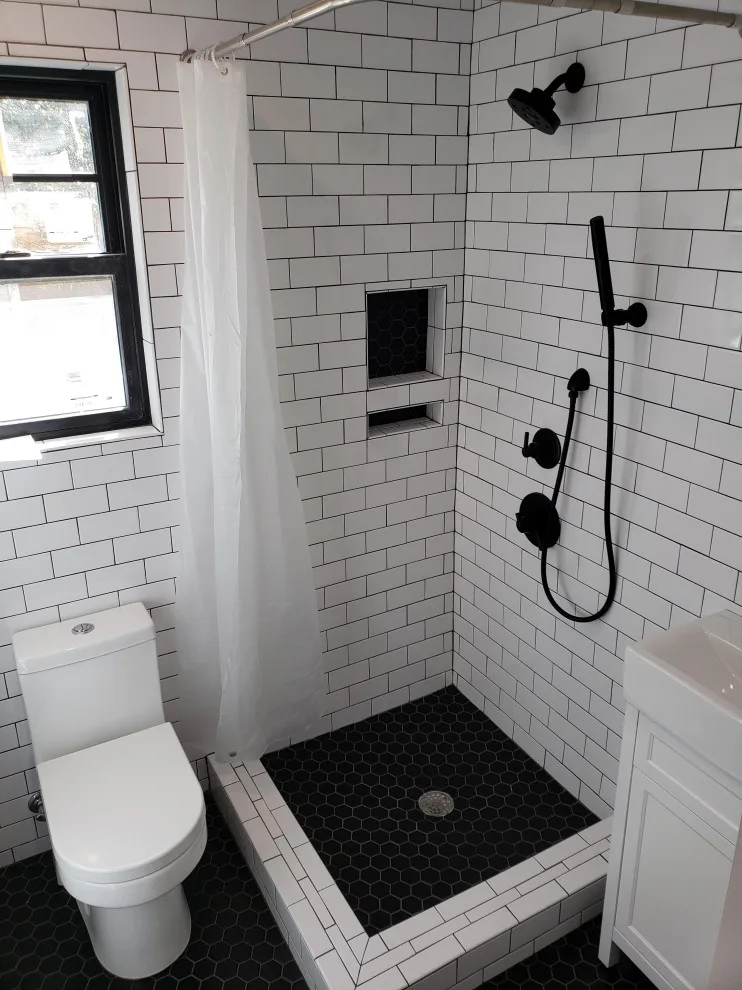 Kensington Restroom by Maison Construction And Renovations - Photo 3