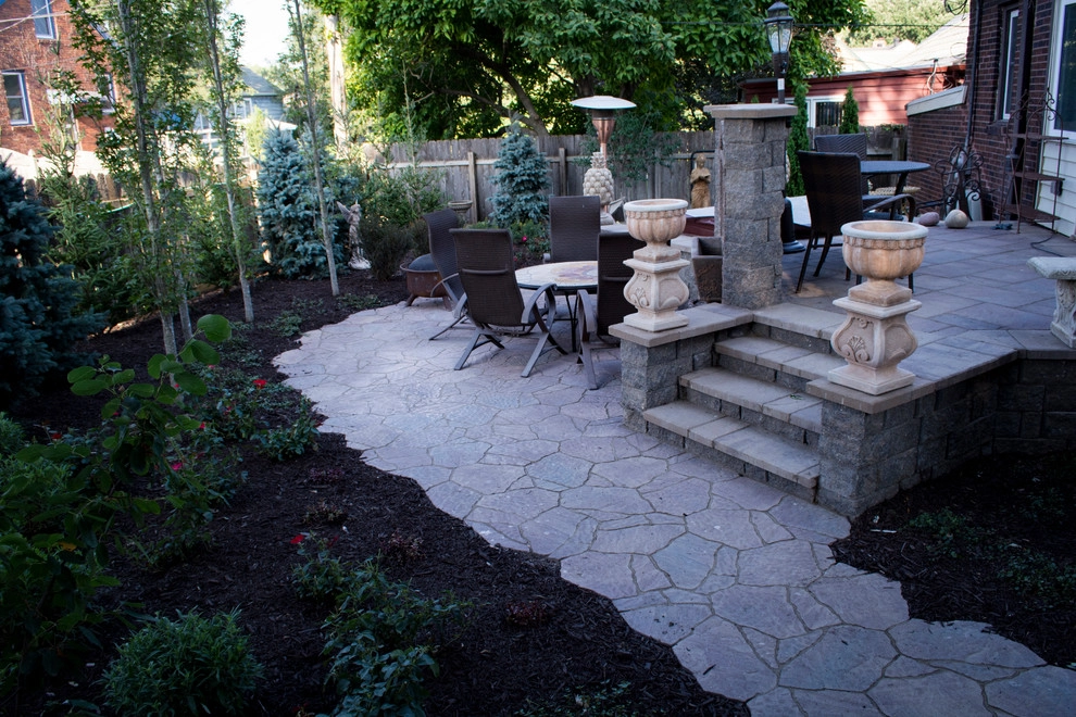 Natural Stone and Statue Garden by Breaking Ground - Photo 13