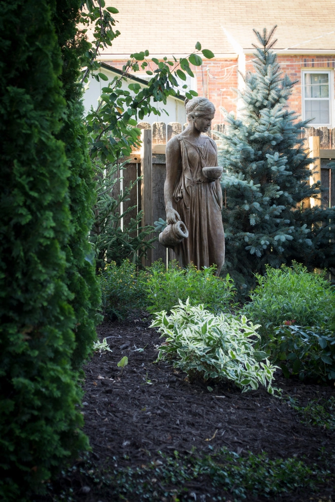 Natural Stone and Statue Garden by Breaking Ground - Photo 6