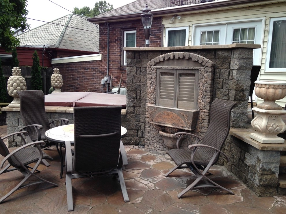 Natural Stone and Statue Garden by Breaking Ground - Photo 4