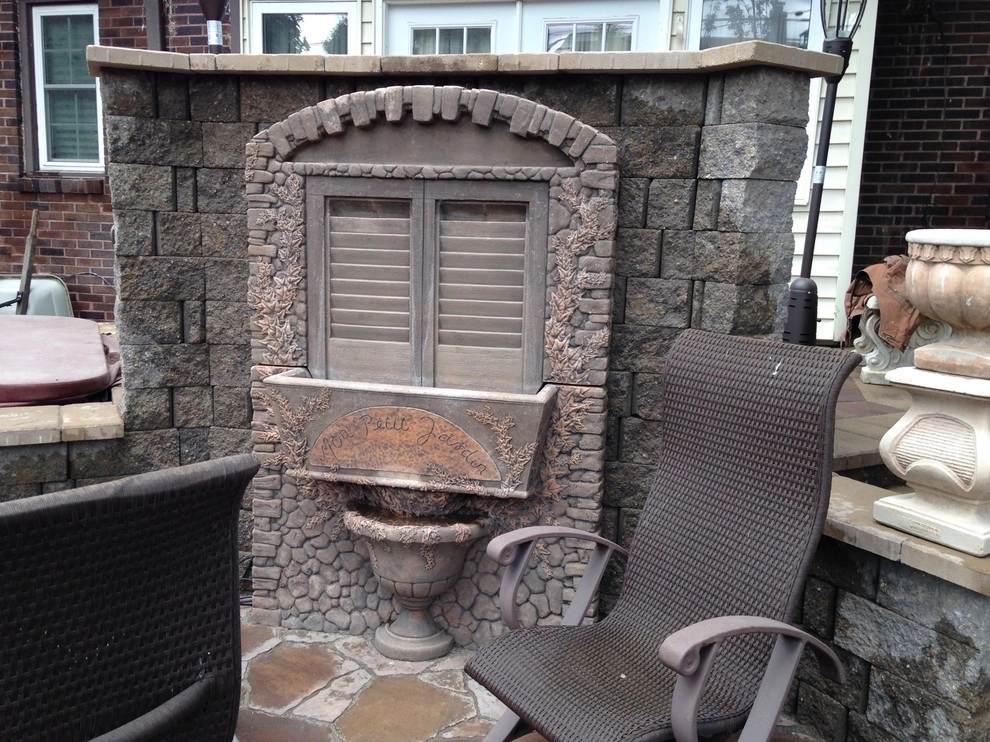 Natural Stone and Statue Garden by Breaking Ground - Photo 18