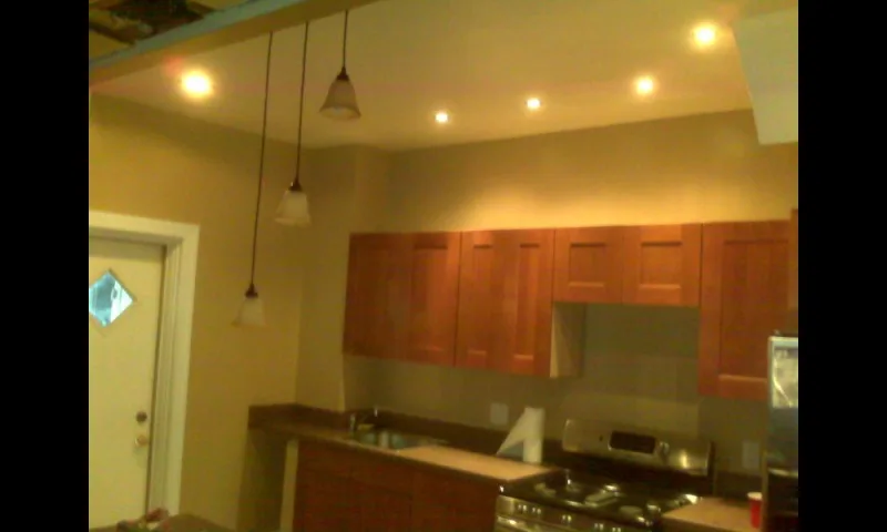 Contemporary Kitchen Renovation and Tailored Enhancements by Ansaaris House Of Construction LLC - Photo 3