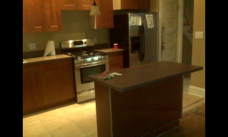 Contemporary Kitchen Renovation and Tailored Enhancements by Ansaaris House Of Construction LLC - Photo 4
