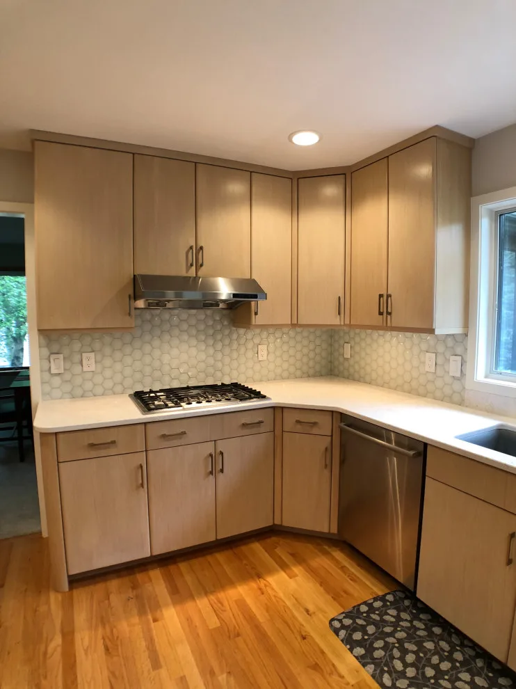 Kitchen Renovation with Glass Tile and Full-Height Quartz Backsplash by D & L Construction - Photo 3