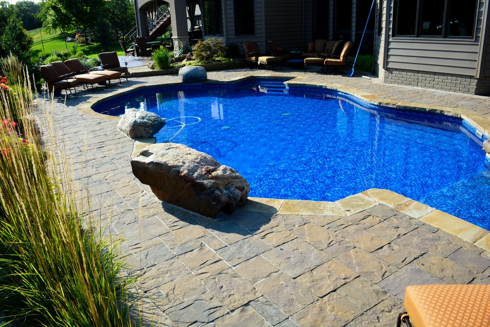 Innovative Pool Patio by Breaking Ground - Photo 40
