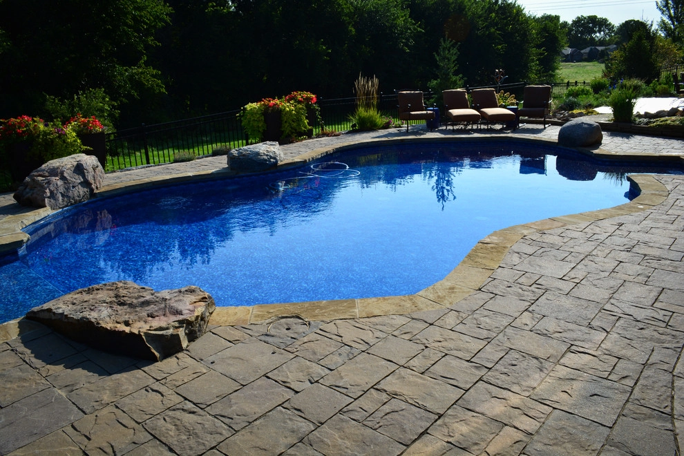 Innovative Pool Patio by Breaking Ground - Photo 22