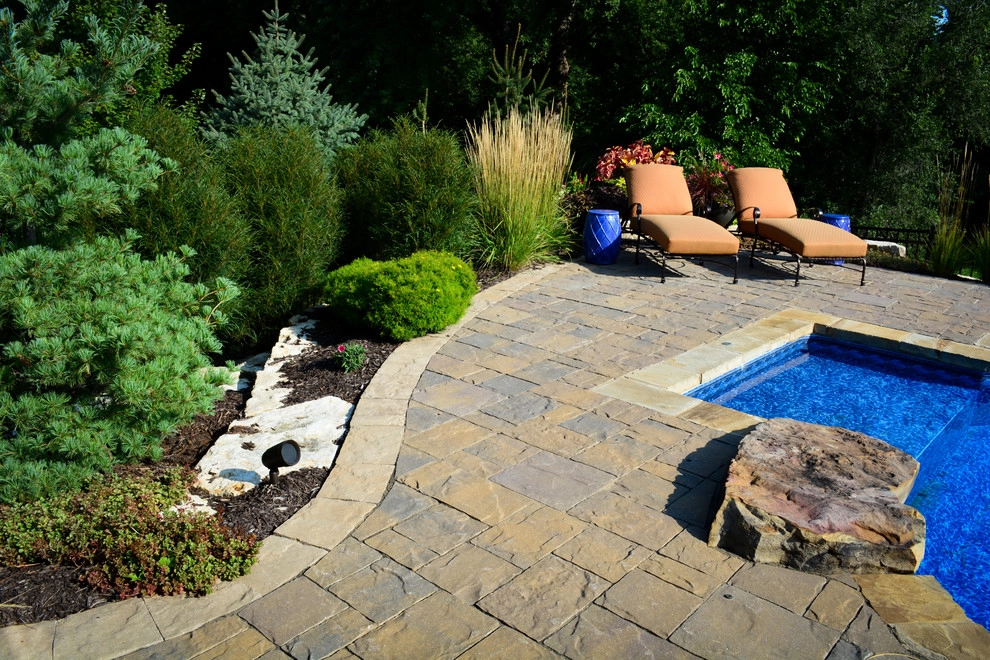 Innovative Pool Patio by Breaking Ground - Photo 6