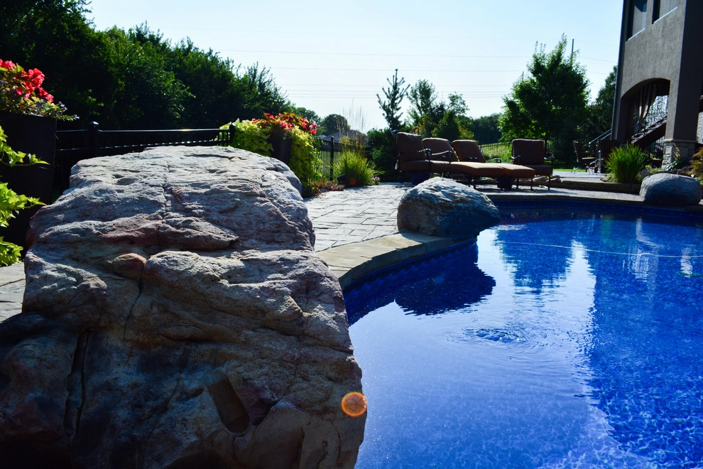 Innovative Pool Patio by Breaking Ground - Photo 20