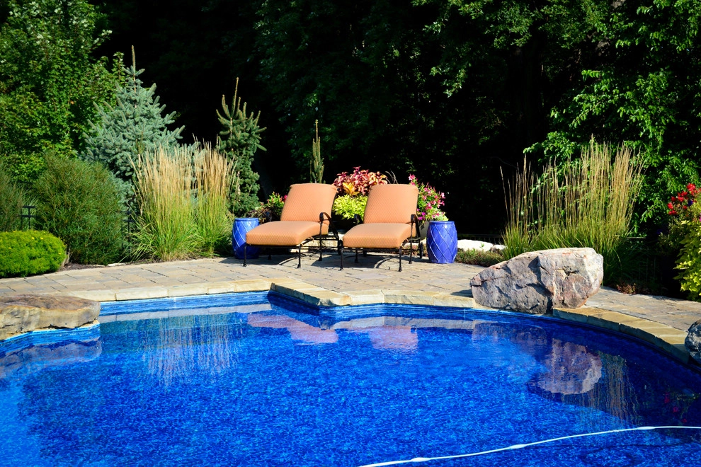 Innovative Pool Patio by Breaking Ground - Photo 18