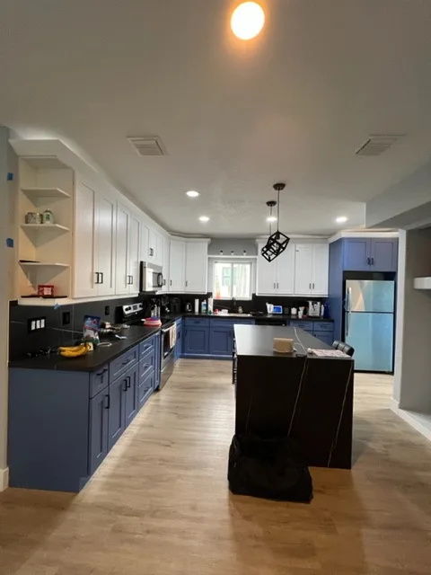 Culinary Space Renovations by One Stop Construction - Photo 11