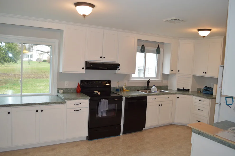 Light and Dark Kitchen by Crossroads Construction - Photo 4