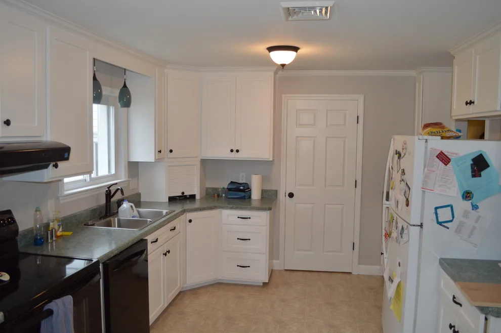 Light and Dark Kitchen by Crossroads Construction - Photo 2