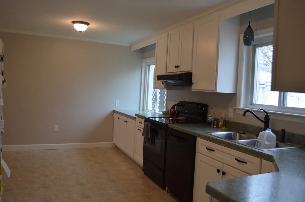 Light and Dark Kitchen by Crossroads Construction - Photo 3