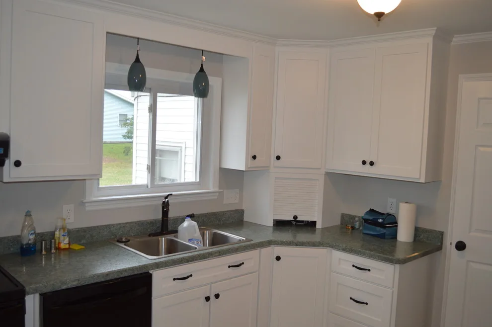 Light and Dark Kitchen by Crossroads Construction - Photo 5