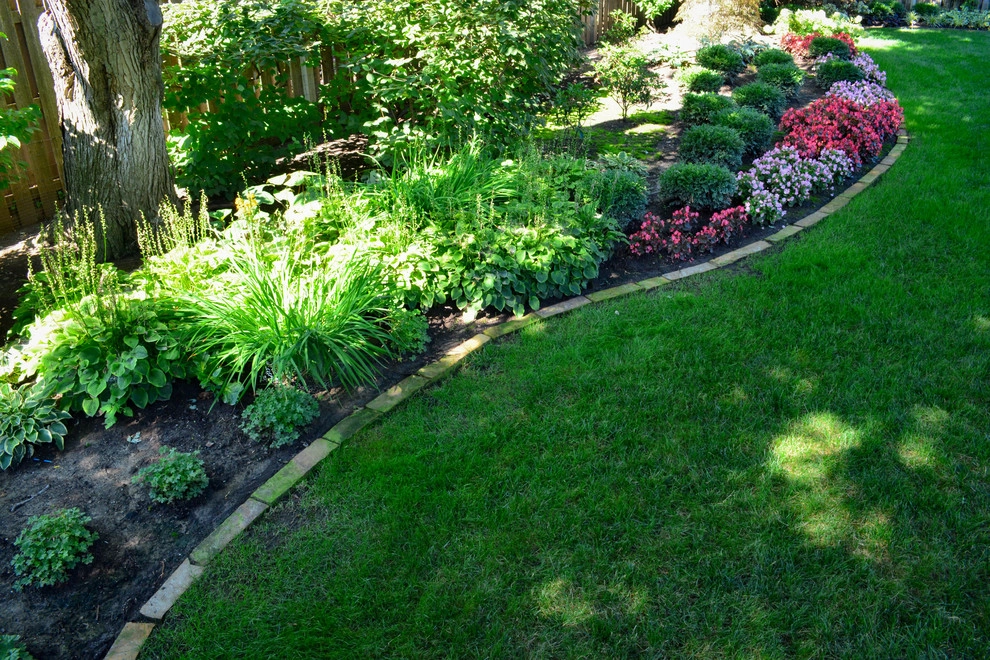Shady Backyard Retreat by Breaking Ground - Photo 7