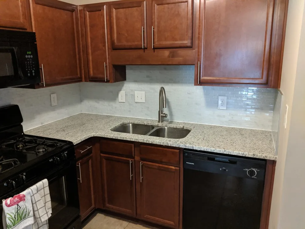 Kitchen Renovation with Tailored Table and Storage Solutions by Ruiz Renovations - Photo 7