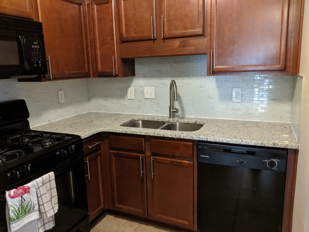 Kitchen Renovation with Tailored Table and Storage Solutions by Ruiz Renovations - Photo 2