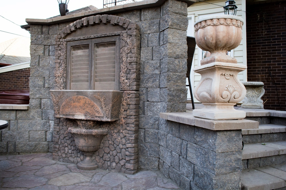 Natural Stone and Statue Garden by Breaking Ground - Photo 10