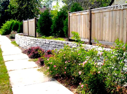 Stone Wall Fence and Garden by Ganshert Nursery & Landscapes - Photo 2