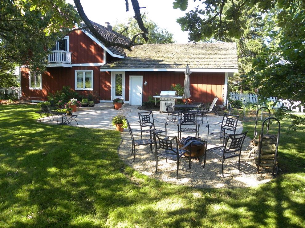 Red House and Patio by Ganshert Nursery & Landscapes - Photo 3