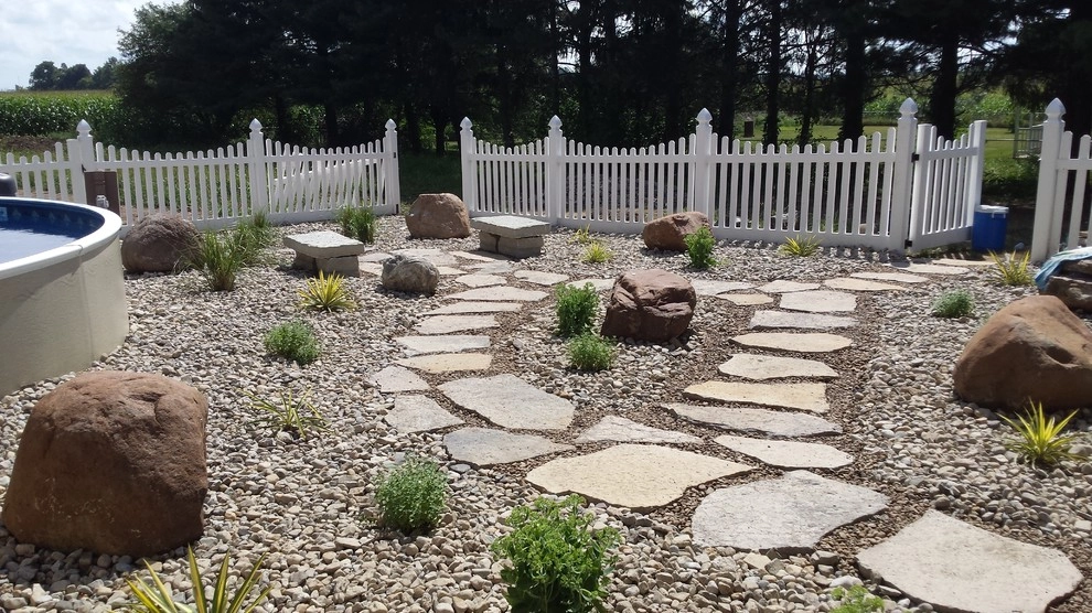 Arwoods backyard pool area by Garden Of Eden Landscaping Services - Photo 9