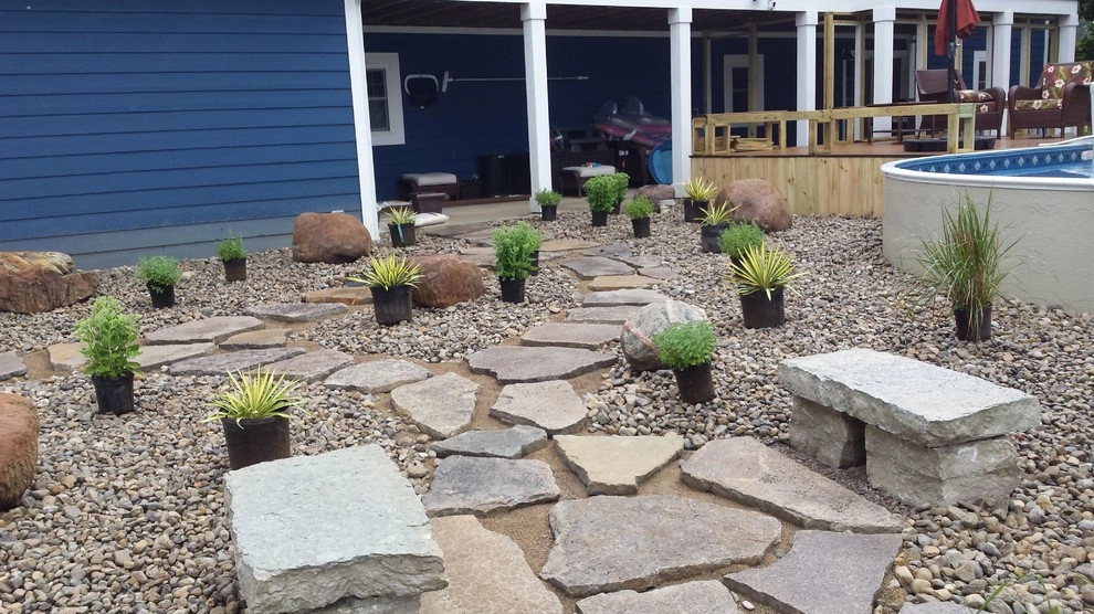 Arwoods backyard pool area by Garden Of Eden Landscaping Services - Photo 12