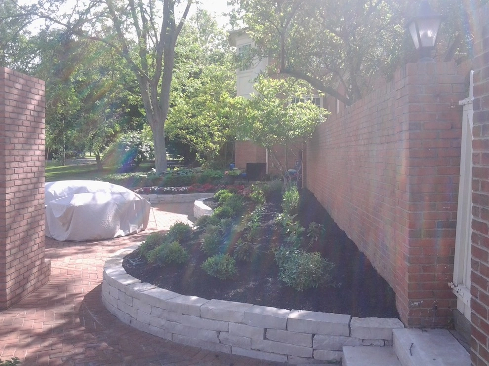 Sehnert's Back Patio Landscape and Driveway by Garden Of Eden Landscaping Services - Photo 28