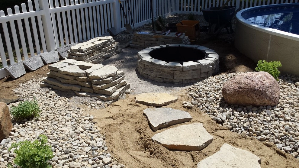 Arwoods backyard pool area by Garden Of Eden Landscaping Services - Photo 10