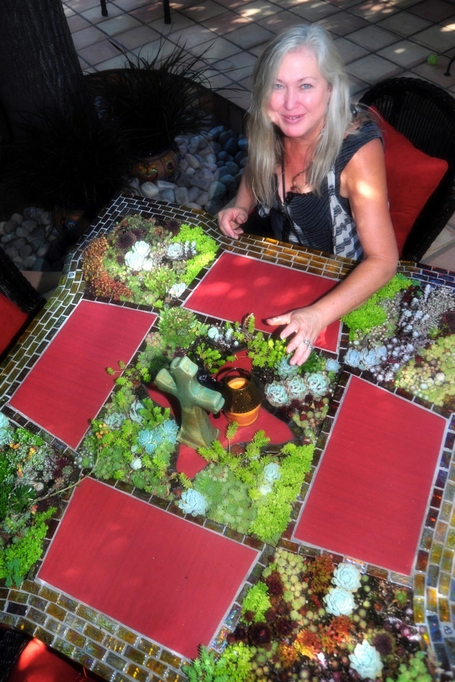 creation of succulent table by Garden To Life Landscaping - Photo 12