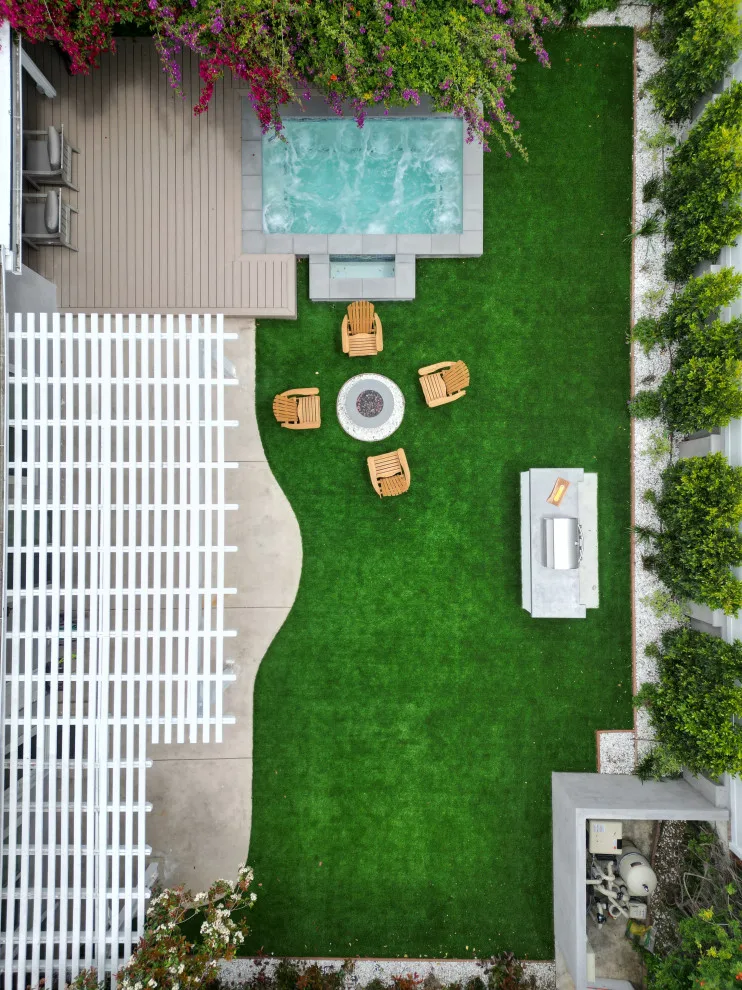 Inviting Outdoor Space with Fire Pit by Royal Family Construction, Inc. - Photo 6