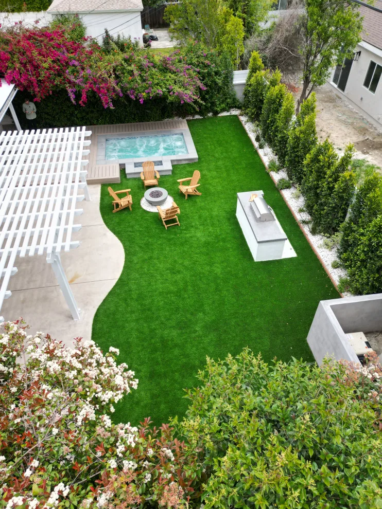 Inviting Outdoor Space with Fire Pit by Royal Family Construction, Inc. - Photo 14