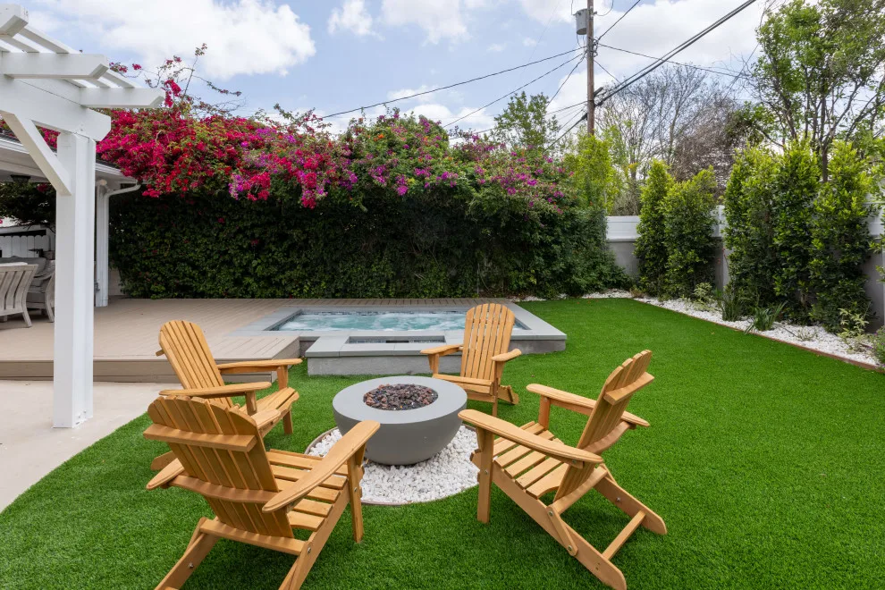 Inviting Outdoor Space with Fire Pit by Royal Family Construction, Inc. - Photo 12