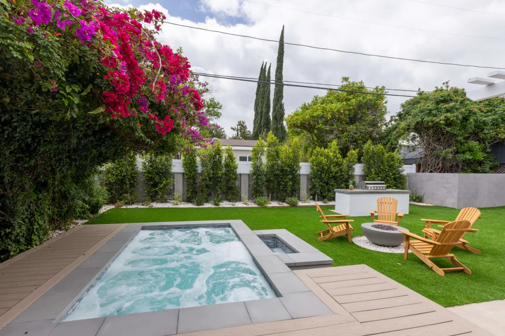 Inviting Outdoor Space with Fire Pit by Royal Family Construction, Inc. - Photo 11