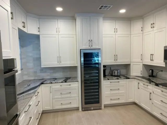 Modern Elegant Kitchens by JSS/Green Planet Construction - Photo 9