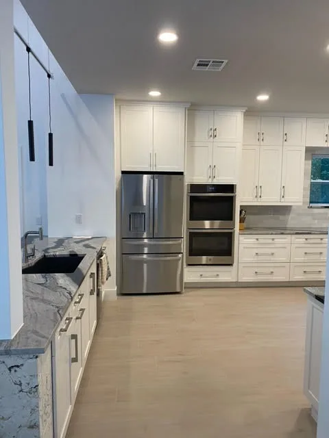 Modern Elegant Kitchens by JSS/Green Planet Construction - Photo 6