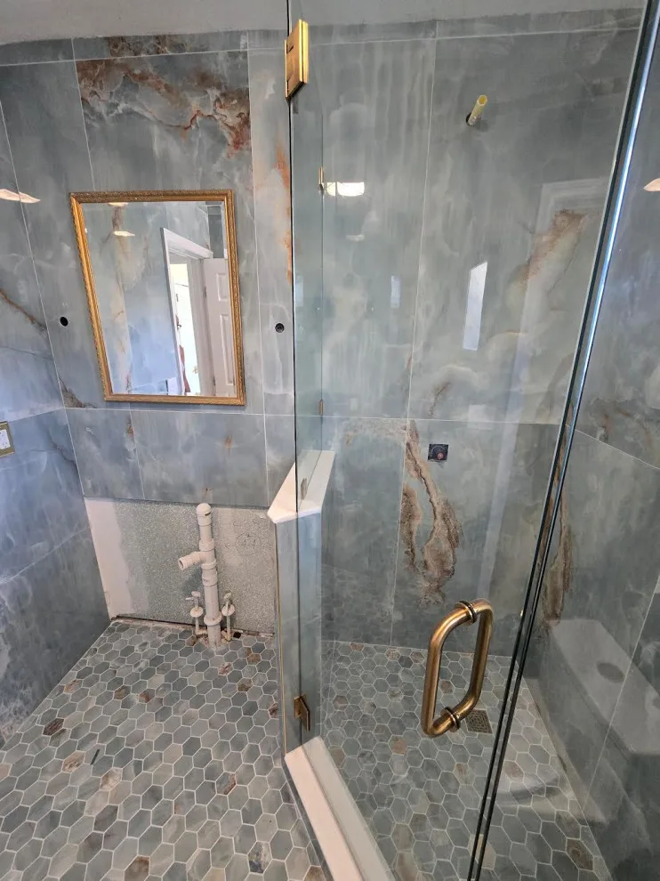 Opulent Teal Marble Shower Design by Level Up Construction & Investment Group LLC - Photo 3